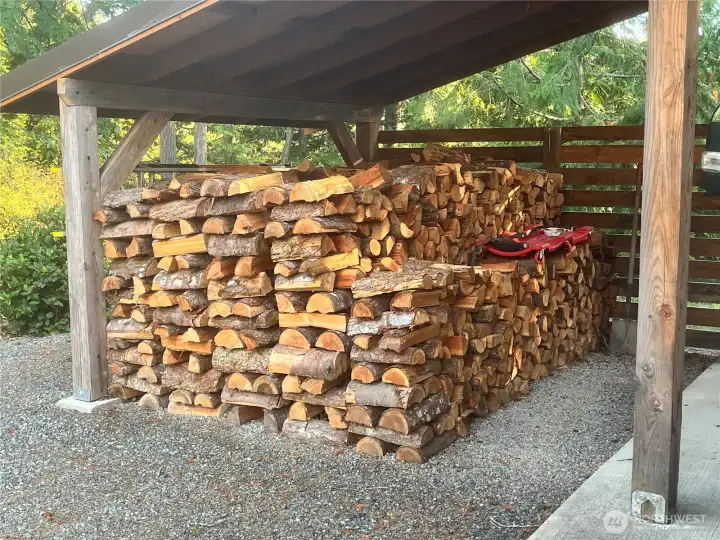 Several cords of wood are included.
