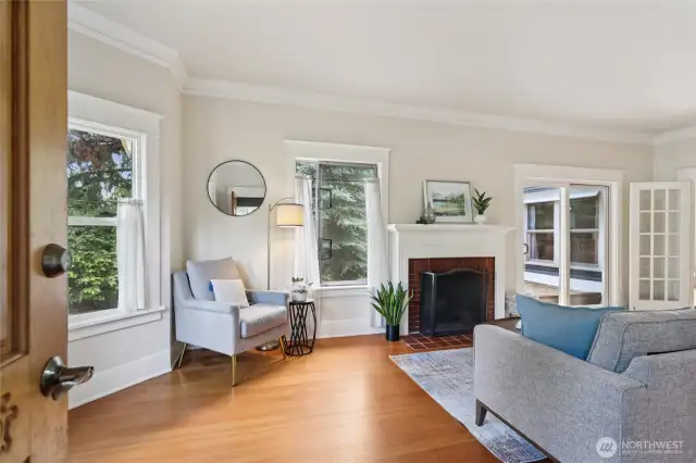 As you enter form the enclosed front porch you'll find all of the original charm. Check out that bay window. Slider goes out to a deck over the carport