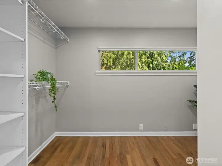 Enormous primary bedroom walk in closet