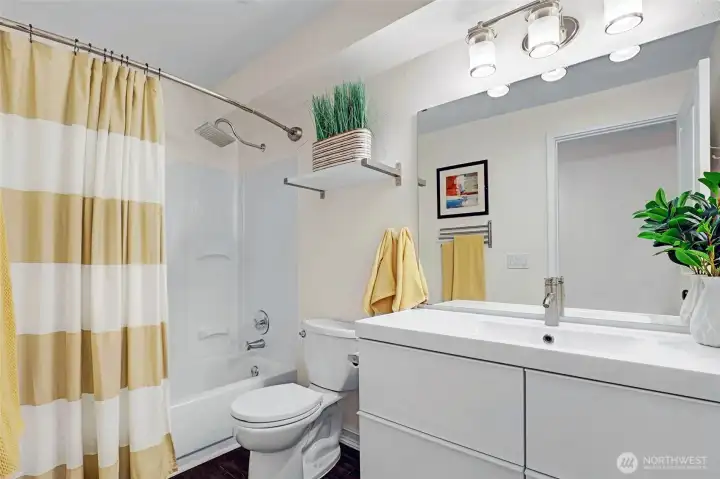 Fully updated bathroom with new tile surround (not pictured).