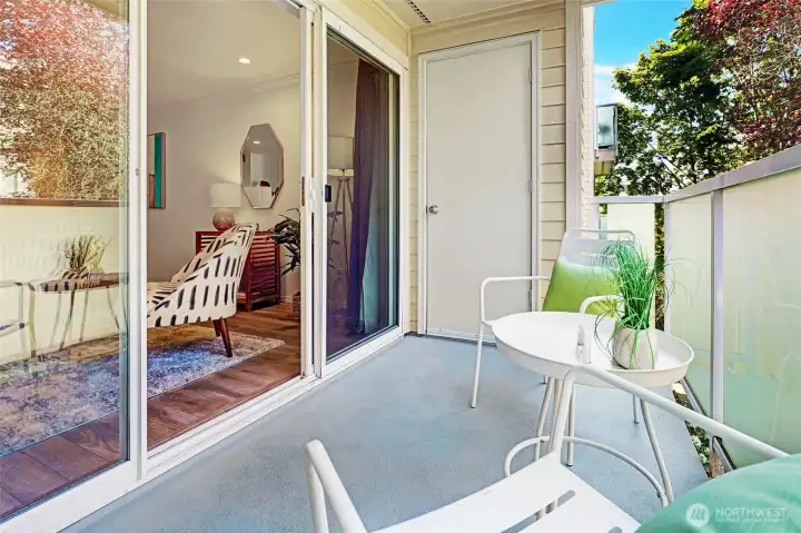 Private balcony with two large storage rooms off each side.