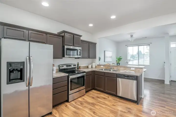 Kitchen With Maple Cabinets And Stainless Steel Appliances