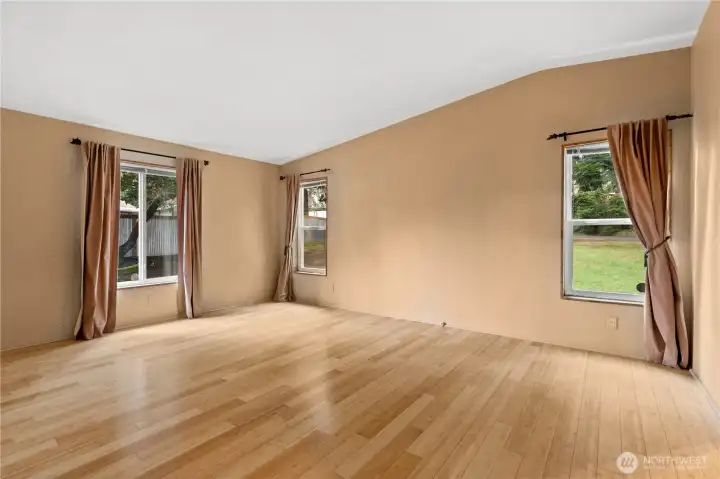 Spacious primary bedroom with lots of natural light.