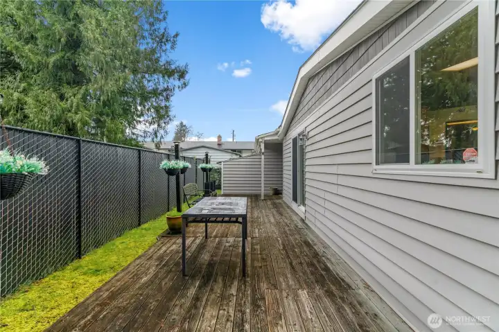 Extra tall privacy fence surrounding the back yard.