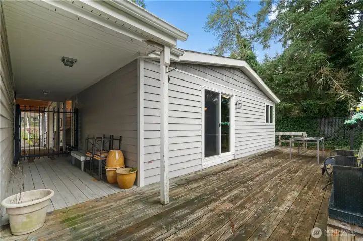 Covered breezeway connecting the house to the garage.