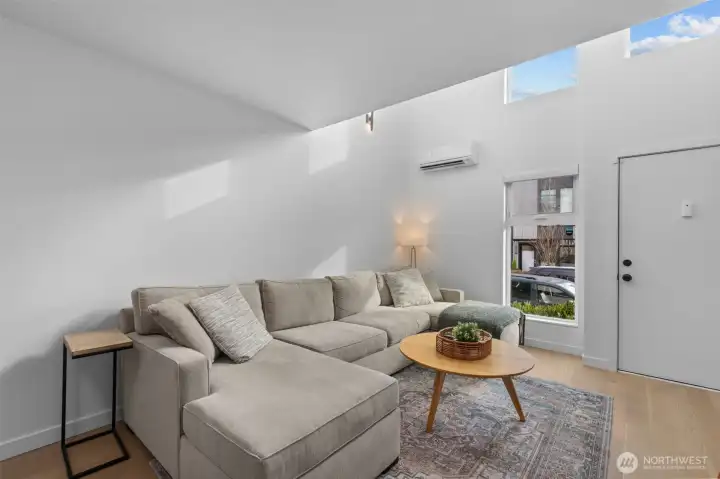 Oak hardwood floors throughout the expansive living & dining.