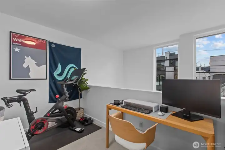 Loft space - perfect for an office, play area, or workout spot.