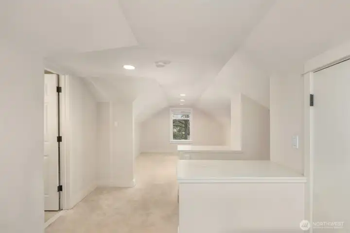 upstairs bedroom (bathroom not pictured) virtually unstaged