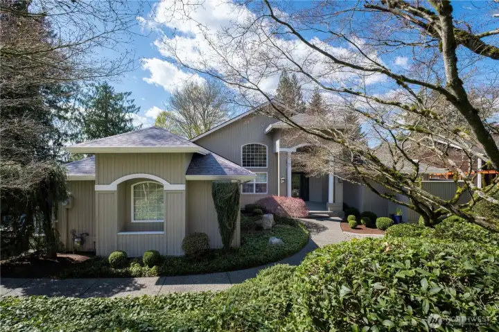 Welcome to your own private paradise in Sammamish!  The home features west-facing views and a great first impression as you enter the property