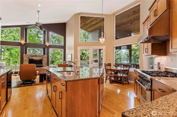 Notice how the gourmet kitchen flows easily into the dining area. All areas of the great room (kitchen, dining and family room) have amazing territorial views. Notice how the gourmet kitchen flows easily into the dining area. All areas of the great room (kitchen, dining and family room) have amazing territorial views.
