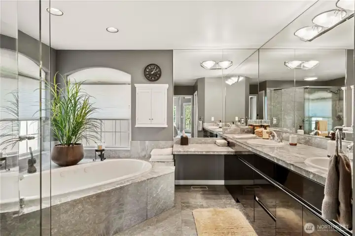 Spas have nothing on this beautiful master ensuite bathroom..  Large soaking tub, double vanities, ample storage and beautiful views.  This is the definition of relaxation!