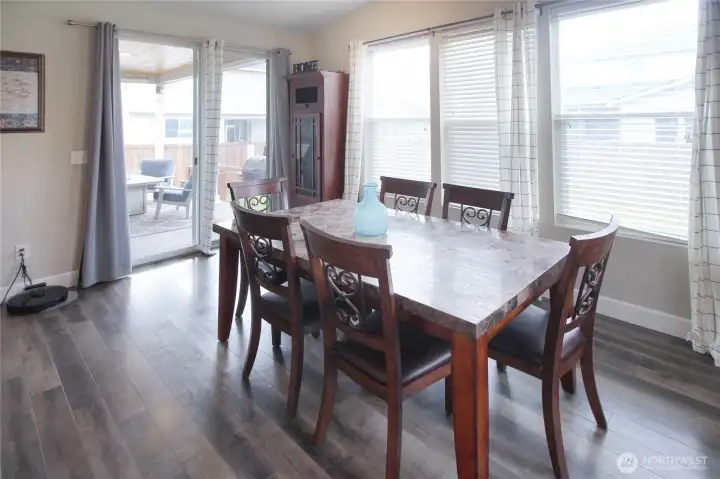 The dining room flows right onto the covered back patio.