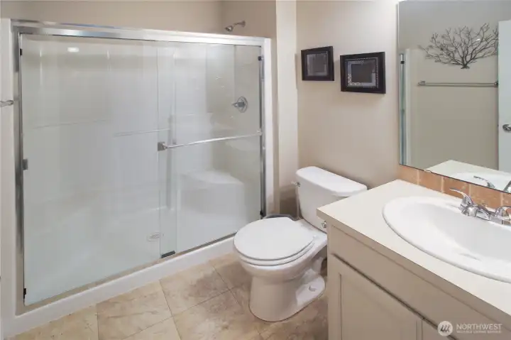 The main floor bathroom with easy to access low-rise shower.