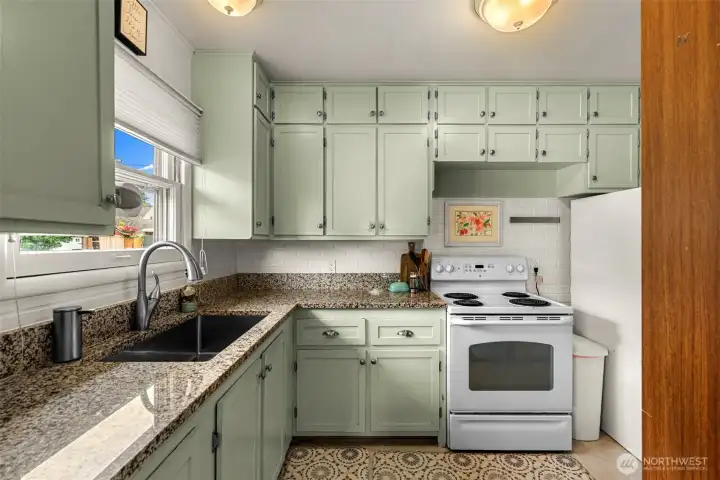 Kitchen with upper cabinets for increased storage Kitchen with upper cabinets for increased storage