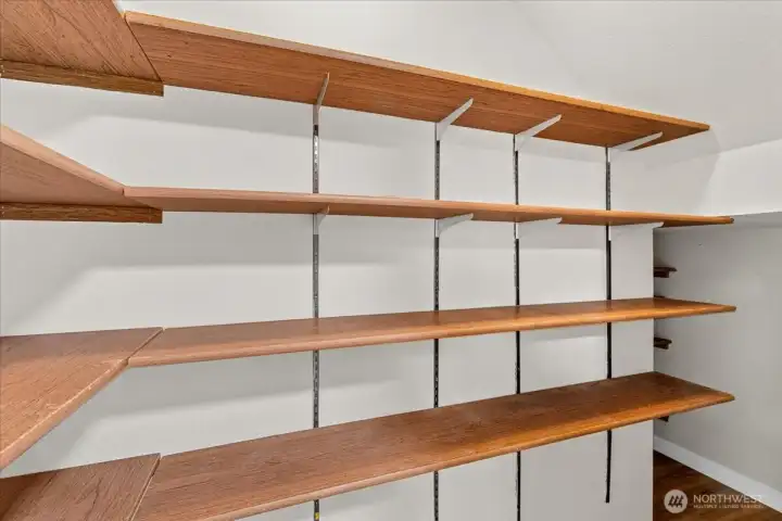 Pantry – Pantry with multiple built-in shelving systems providing substantial organization and storage capacity.
