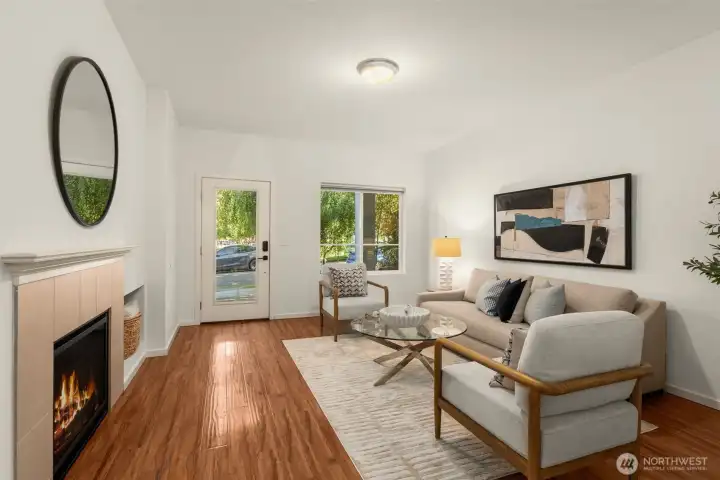 Spacious living room with high ceilings & gas fireplace