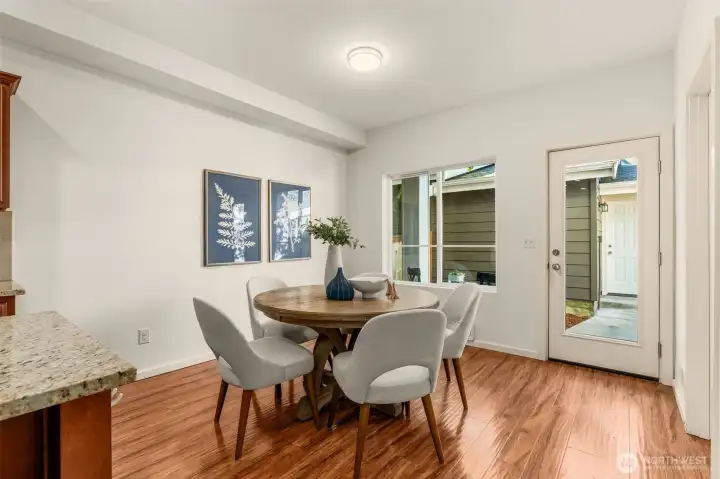 Dining room leads to back covered patio for BBQ's