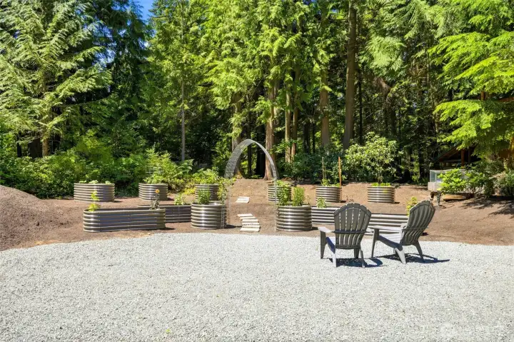 Sunny garden area with raised beds. . .