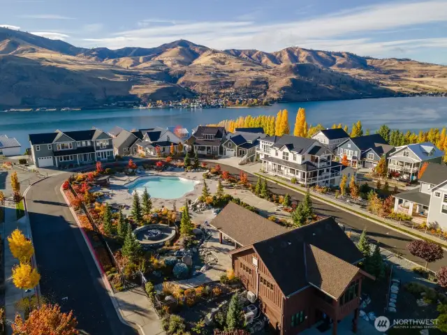 Aerial view of The Lookout's Hilltop Pool, park and clubhouse looking south towards the marina and waterfront.