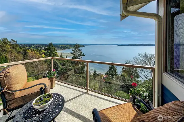 Upper deck off the primary bedroom. Large enough for two chairs and a table with views that see as fare as the eye can see.