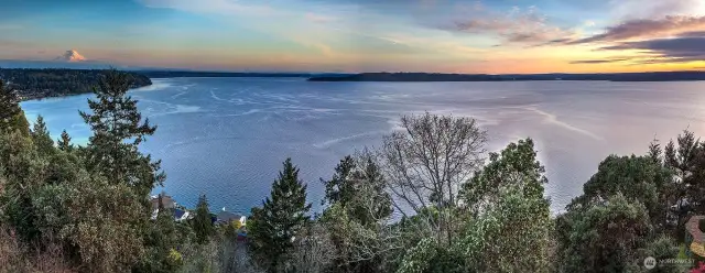 The view is even better in person.  A must see home to experimce all it has to offer.  This is looking directly souoth to Mt. Rainier, Puget Sound, Maury Island and the south tip of Vashon.  Tacoma is over the top of Maury Island.  This is the shipping lane for all large cargo ships to and from Tacoma.  Gorgeous!