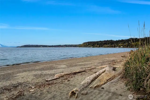 Community and Public beach access just at the bottom of the hill.  Easy walking distance. You can put your paddle board in the water here.  Hidden gem here at Three Tree Point.