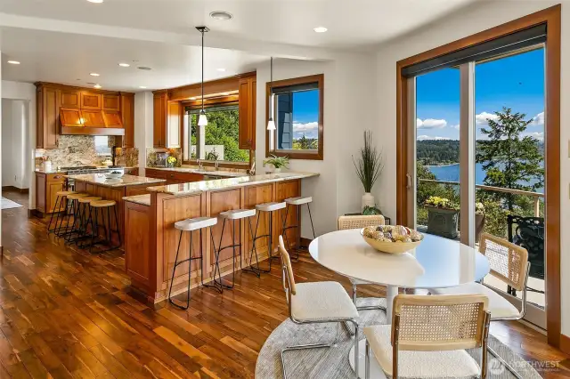 Second slider to main deck, simple eating space here or leave this open for walking and entertaining.  Looking into the full bar and living room.