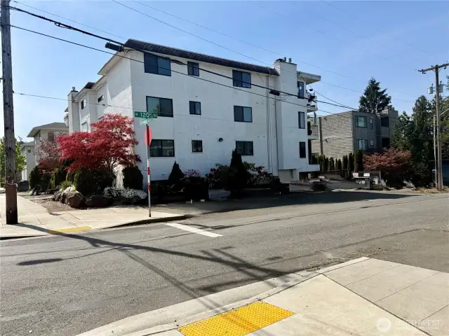 Guest parking located on the north side of building as well as street parking available