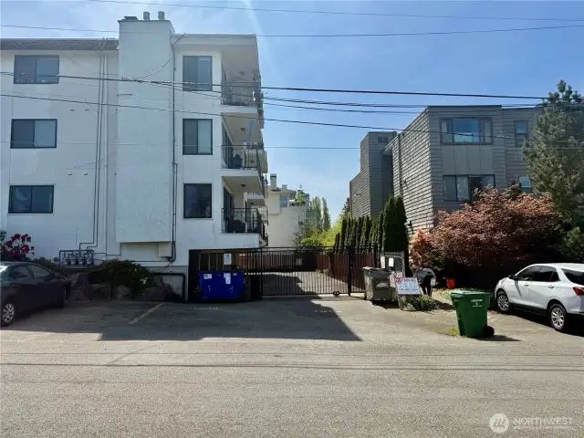 Carport location is through this secured gate. Comes with remote for new owner. Spot is just inside gate on left