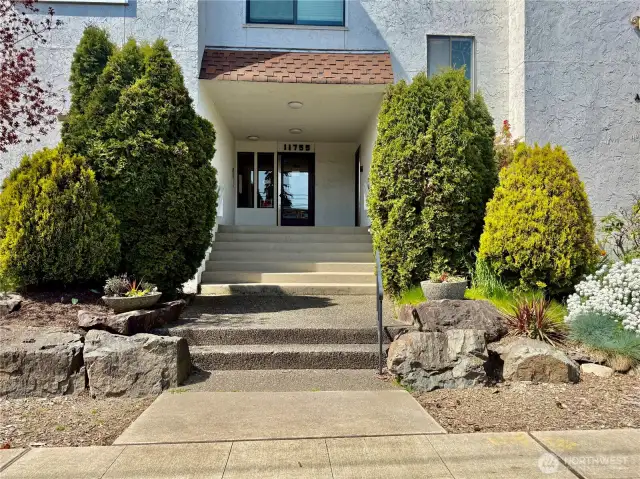 Guests will arrive through this lovely front entrance where they will call you through the intercom system.