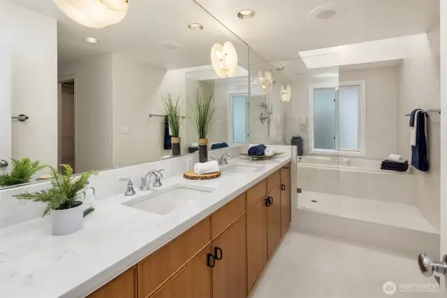 Are we at the Four Seasons? It certainly feels like it! Take in this amazing primary bath suite. Plunge in a bubbly tub and then step right out for a shower in this fantastic wet room concept!