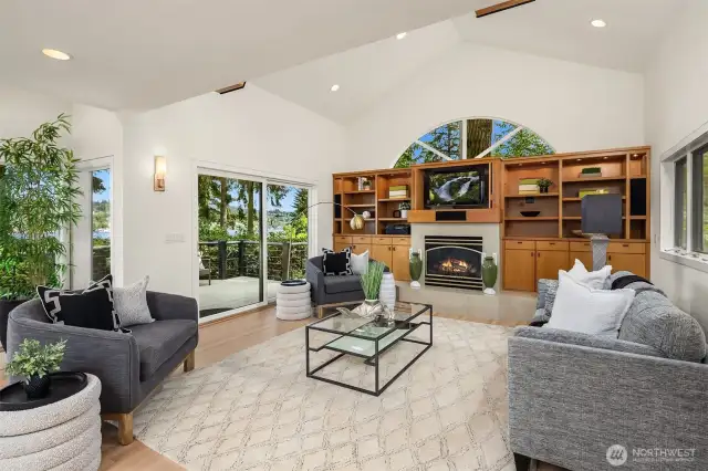 Soaring ceilings and walls of windows are an integral element of this open design.