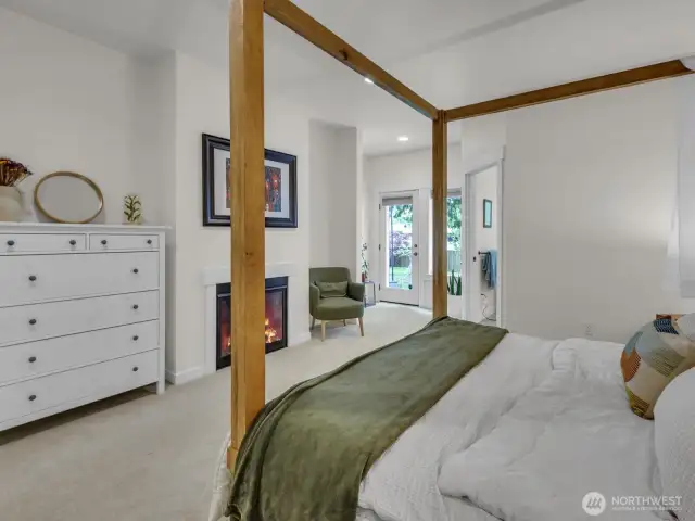 Fireplace and the door leads out to the backyard patio.