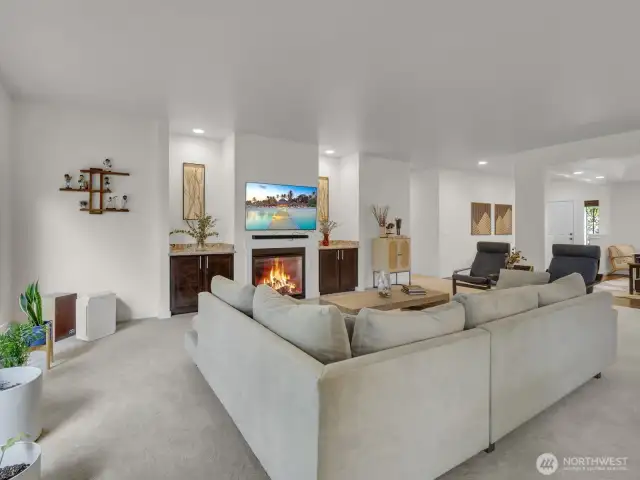 The great room with fire place and built-ins.
