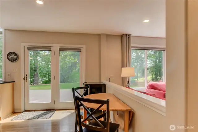 Informal dining nook with french doors to the outside