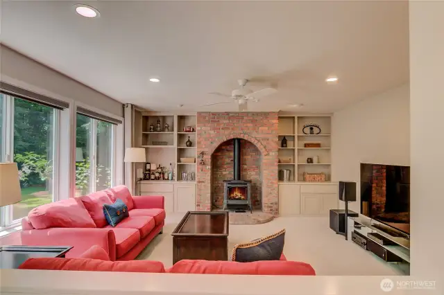 Large family room with another gas fireplace for perfect ambiance