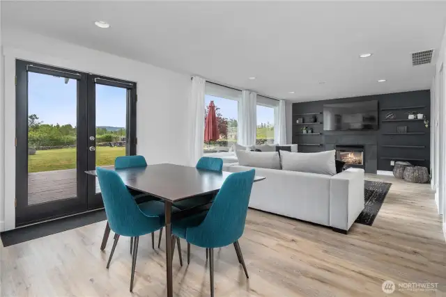 From the informal dining spce, find yourself cozied up in this chic and sleek living room!