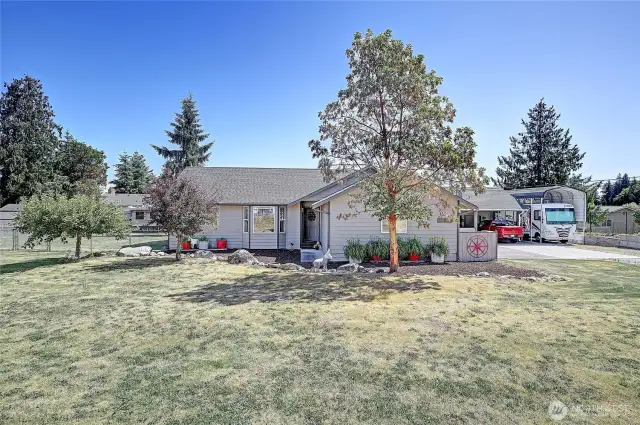 DOUBLE LOT! Charming and well-kept 1,297 sq ft rambler featuring 3 bedrooms and 1.75 baths—all on one level
