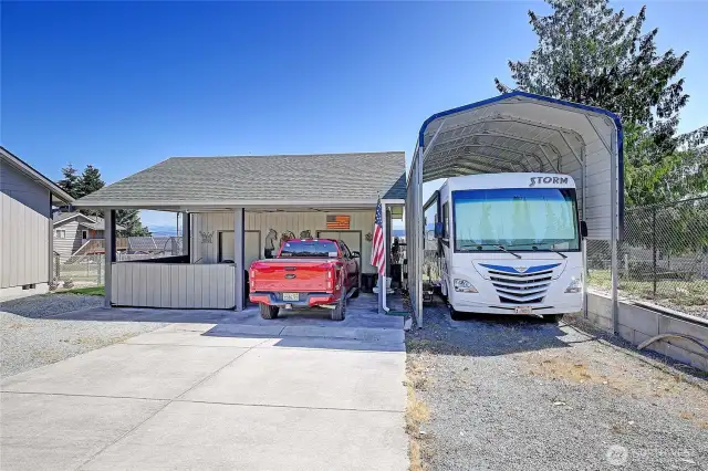 detached carport + RV parking - boasts additional storage and shop space