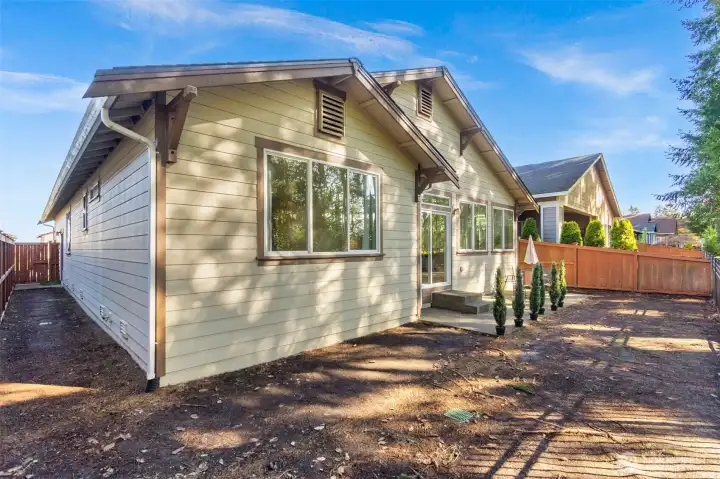 Full view of the backyard space and back of the house.