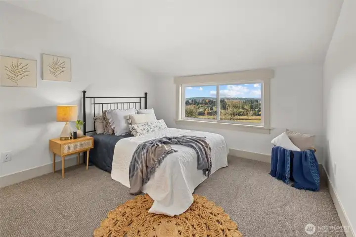 One of two identical upper-level guest bedrooms with views! Upper level also includes large bonus room, full guest bathroom and tons of closet space!