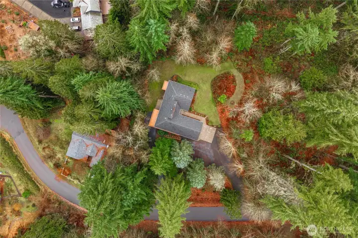 Over 3/4 of an acre of privacy, extra parking, two driveways and a greenbelt on one side with creek that you can hear from your home.