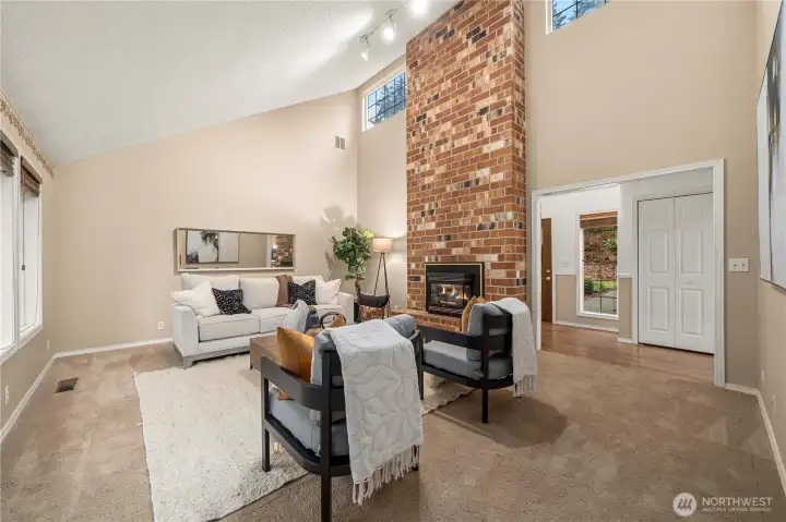 Lots of natural light and room in this living room across from the main level entry.