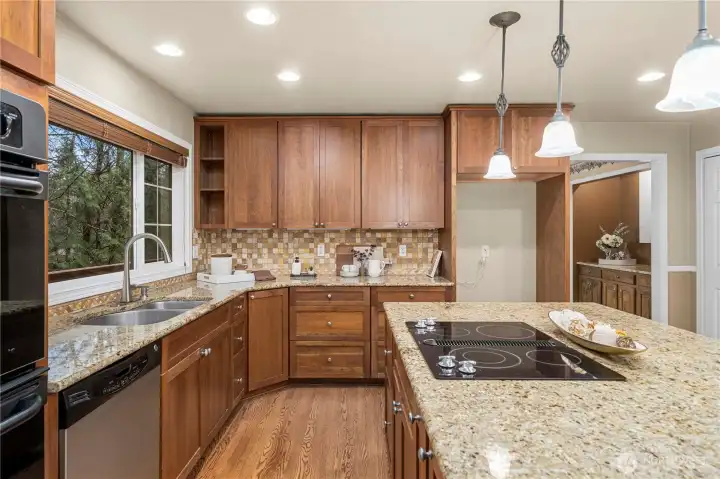 Huge kitchen island, stainless steel appliances, built in microwave, double oven and more!