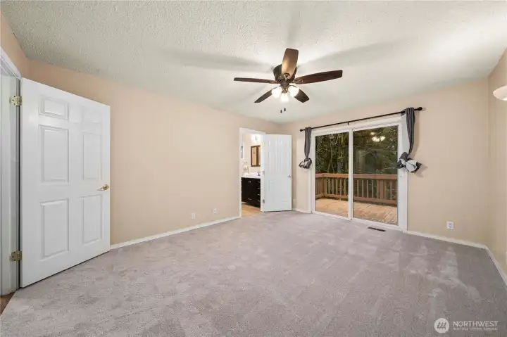 Primary suite includes a beautifully updated en suite bath.