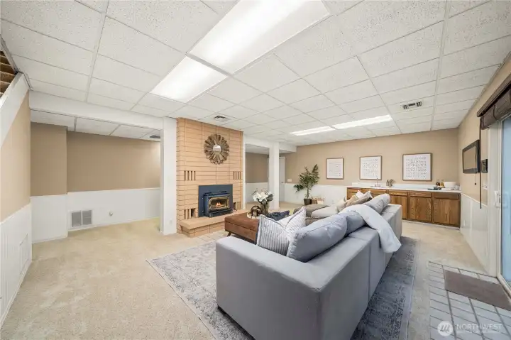 Downstairs family room is huge!!! Note the door in the back that goes out to attached garage #2. The downstairs has its own garage and driveway!