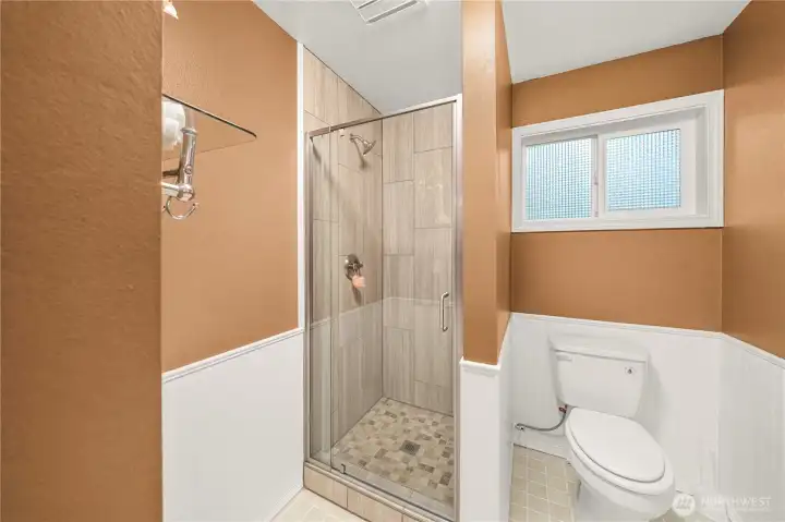 Beautiful walk in shower has already been updated for you.