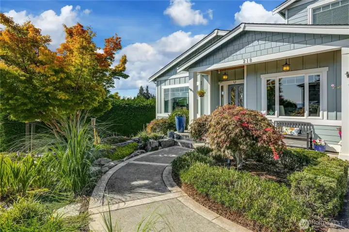 Water feature near the front door cascades to a koi pond.