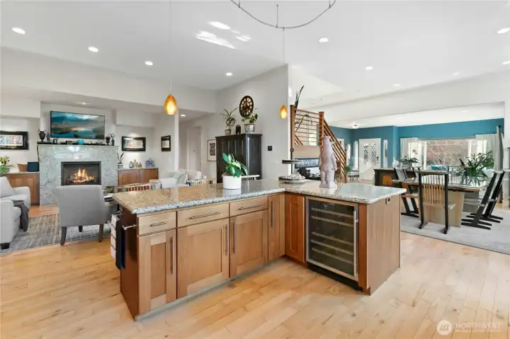 Wine fridge, pullouts, maple cabinets, and tons of storage.