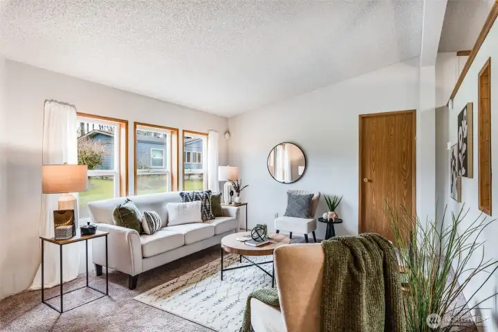 Bright windows and high ceilings give this room a great feeling!